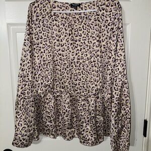 Chic Leopard Print Blouse with Ruffle Hem